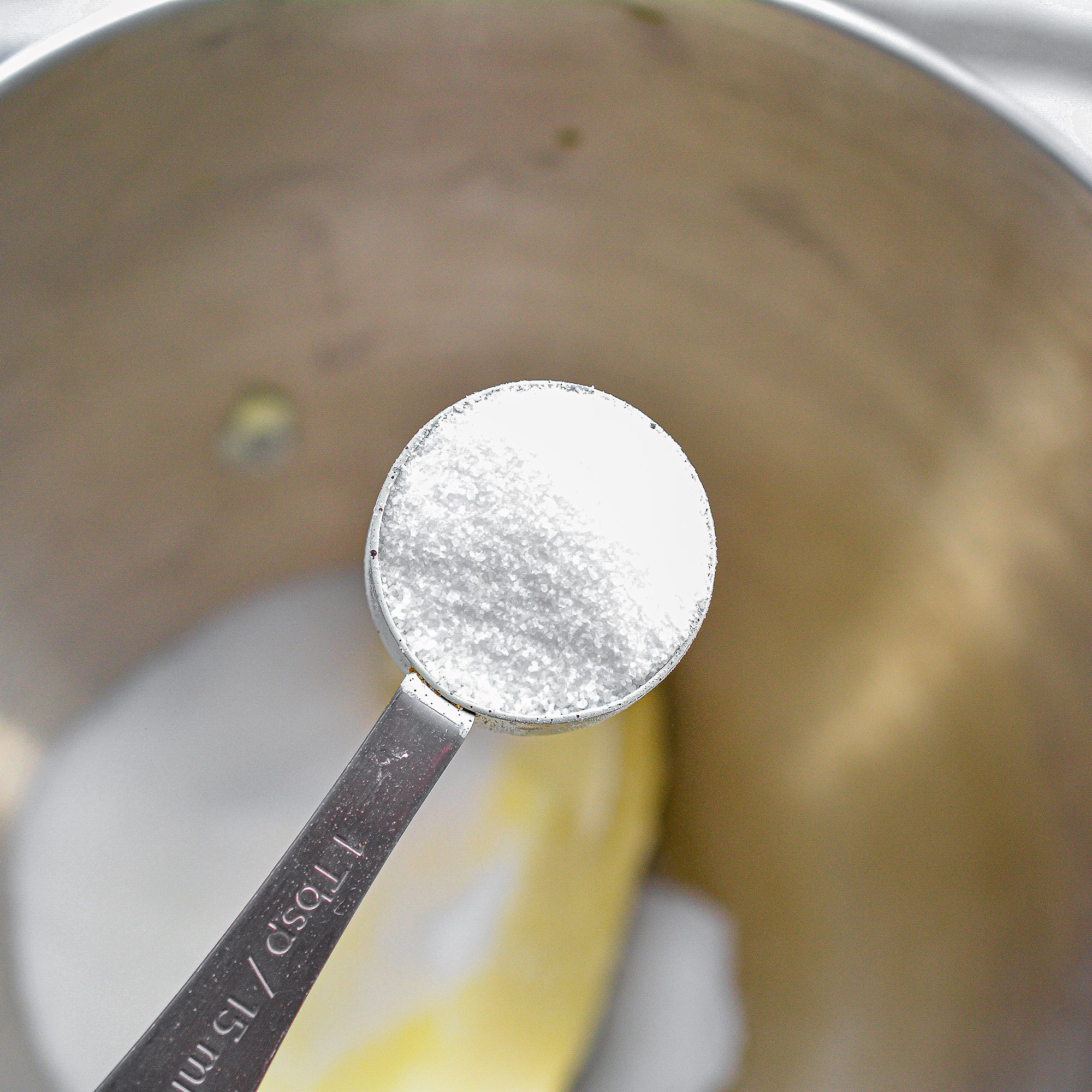 In a mixing bowl, blend together the sugars, butter and vanilla until creamy.