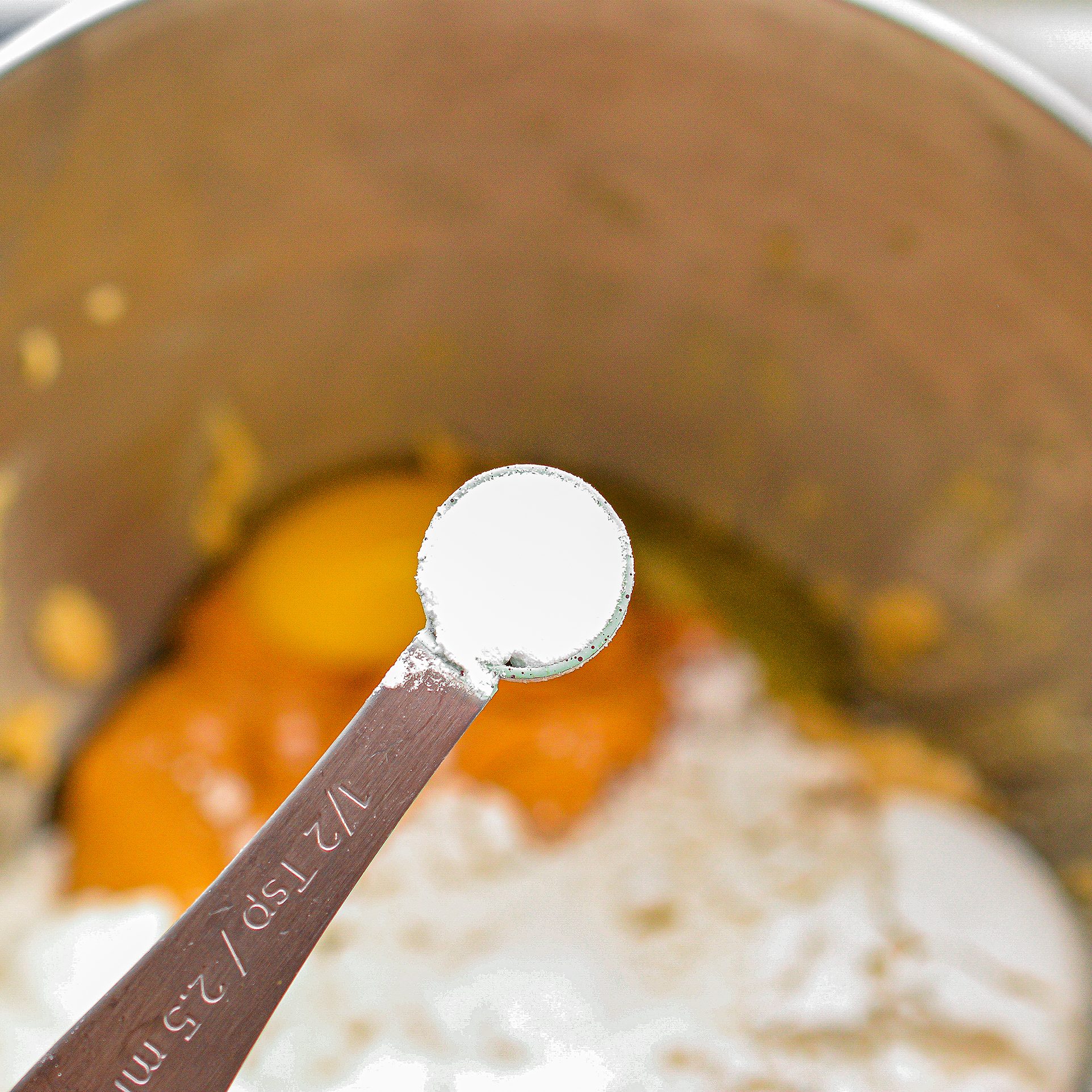 Mix in the peanut butter, egg, salt, baking soda and flour until a smooth batter forms.