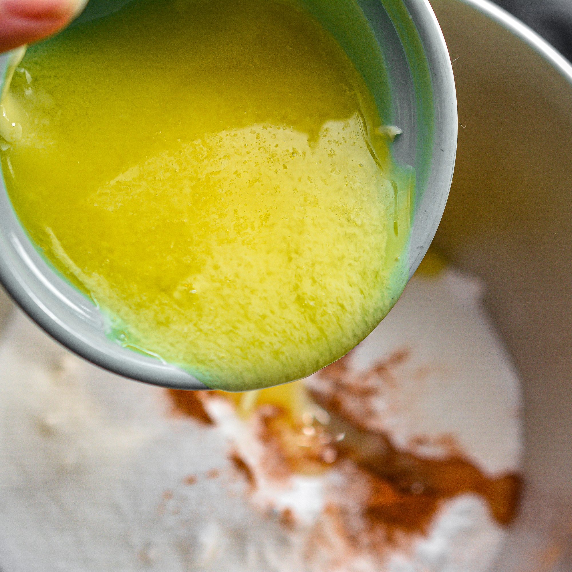 Mix together the flour, sugar, salt, baking soda, ground cinnamon, melted butter and eggs.