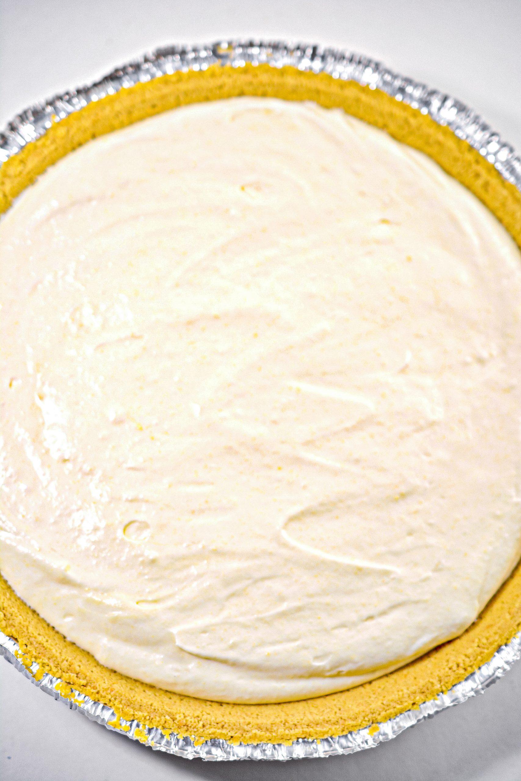 Pour the cheesecake mixture into the prepared pie crust