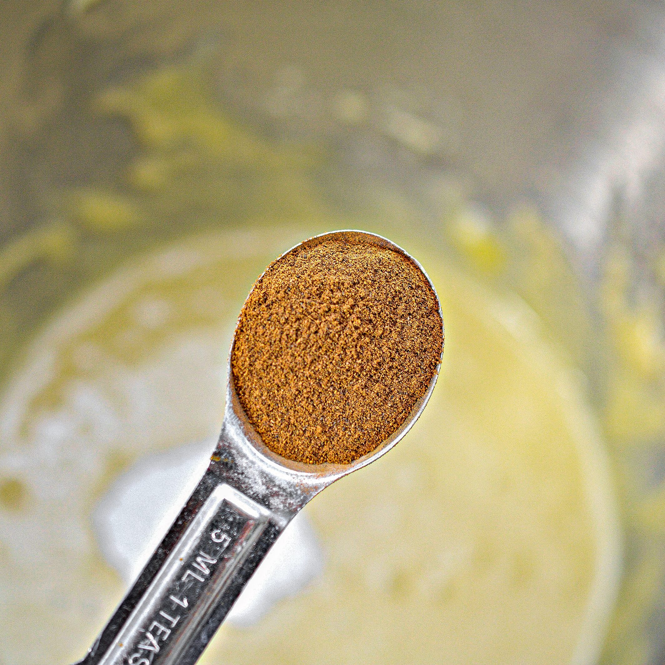 Mix the baking powder, nutmeg, cinnamon, salt, and vanilla into the batter.