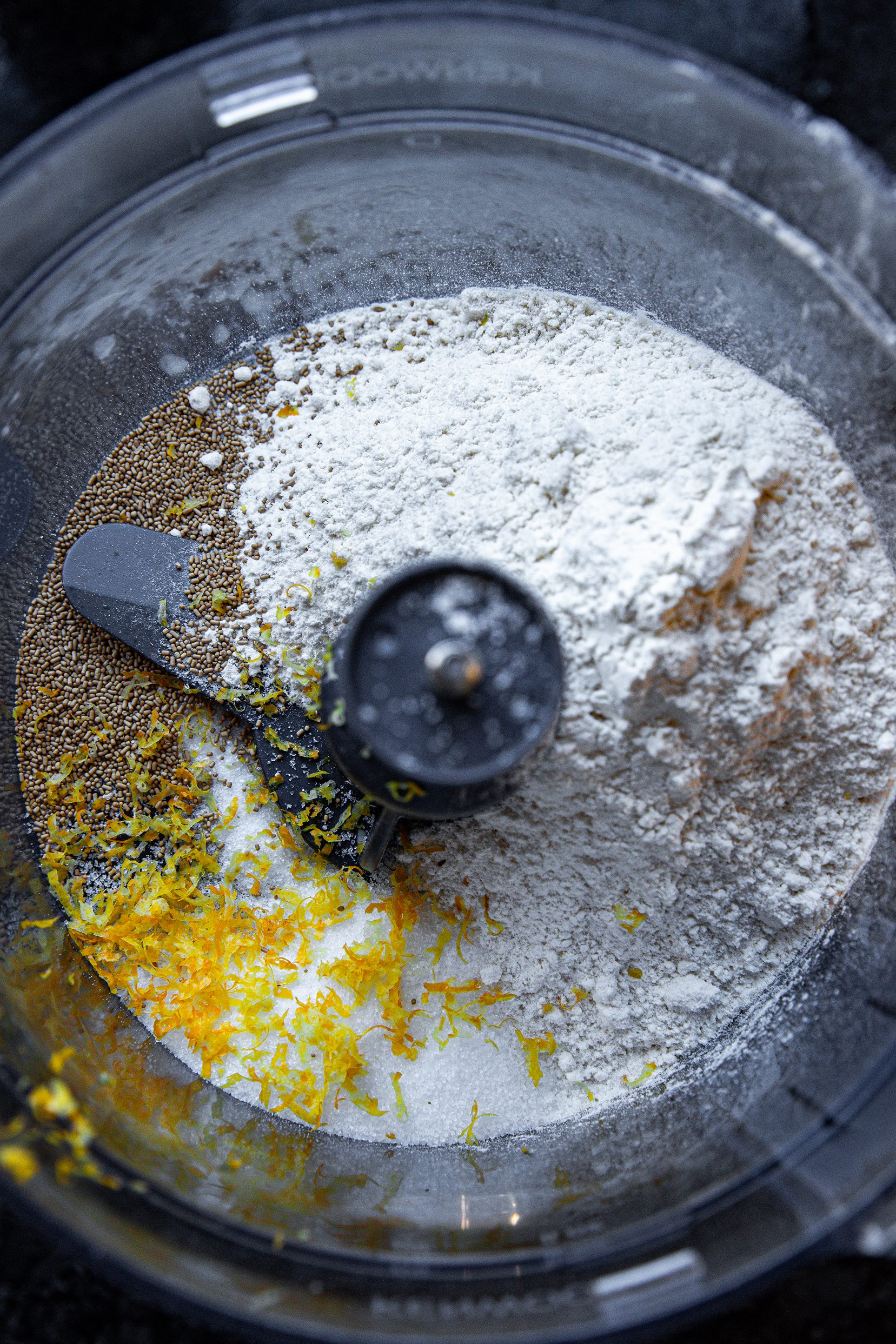 In a mixer combine the flour, yeast, salt, sugar, and lemon zest.