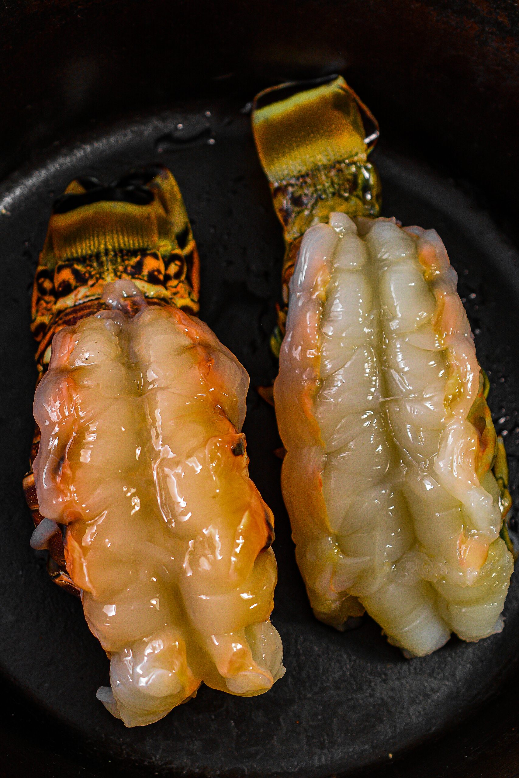 Spread the marinade over the top of each lobster tail.