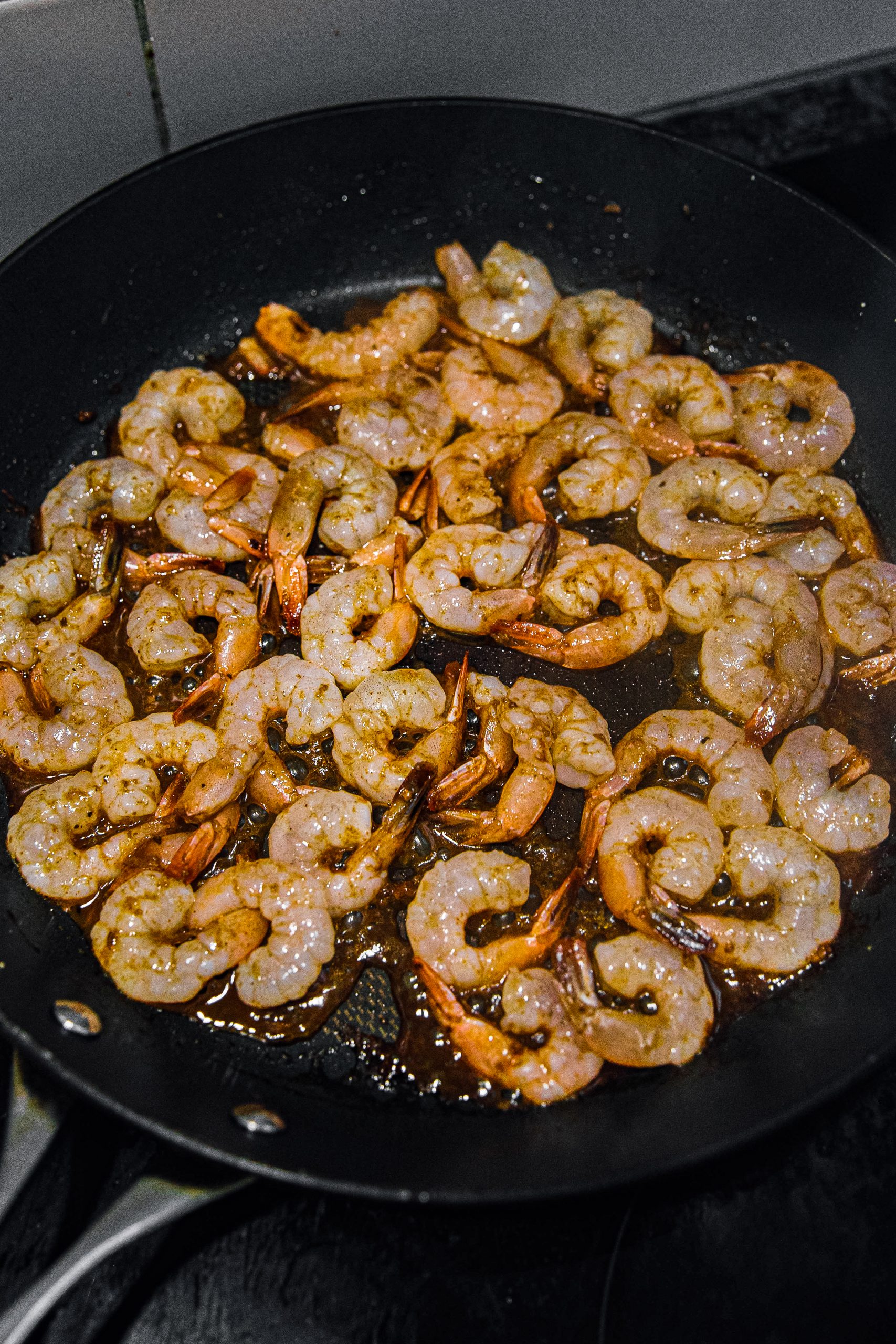 Add shrimp and cook for 2-3 minutes a side until pink and cooked through.
