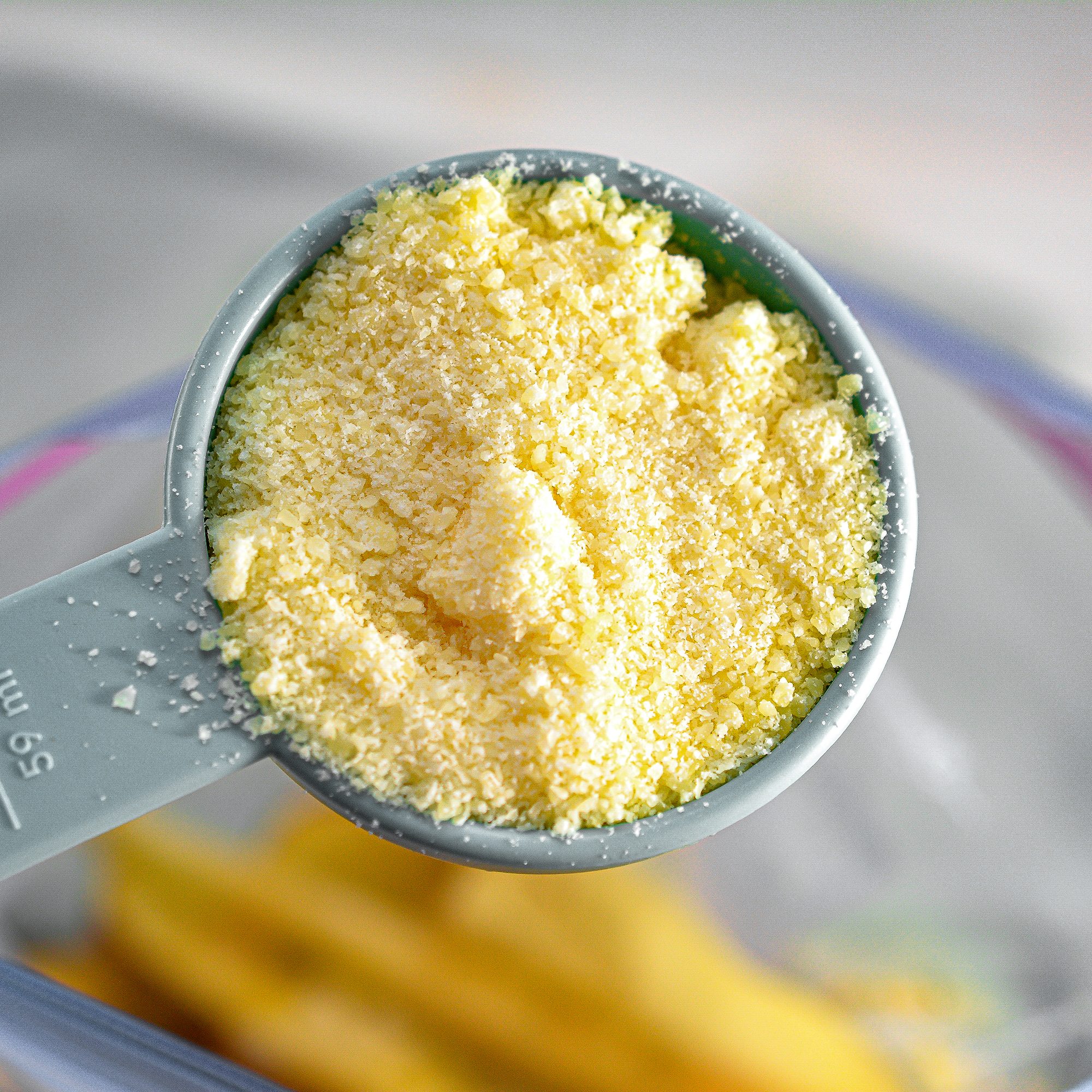  Adding Parmesan cheese grated