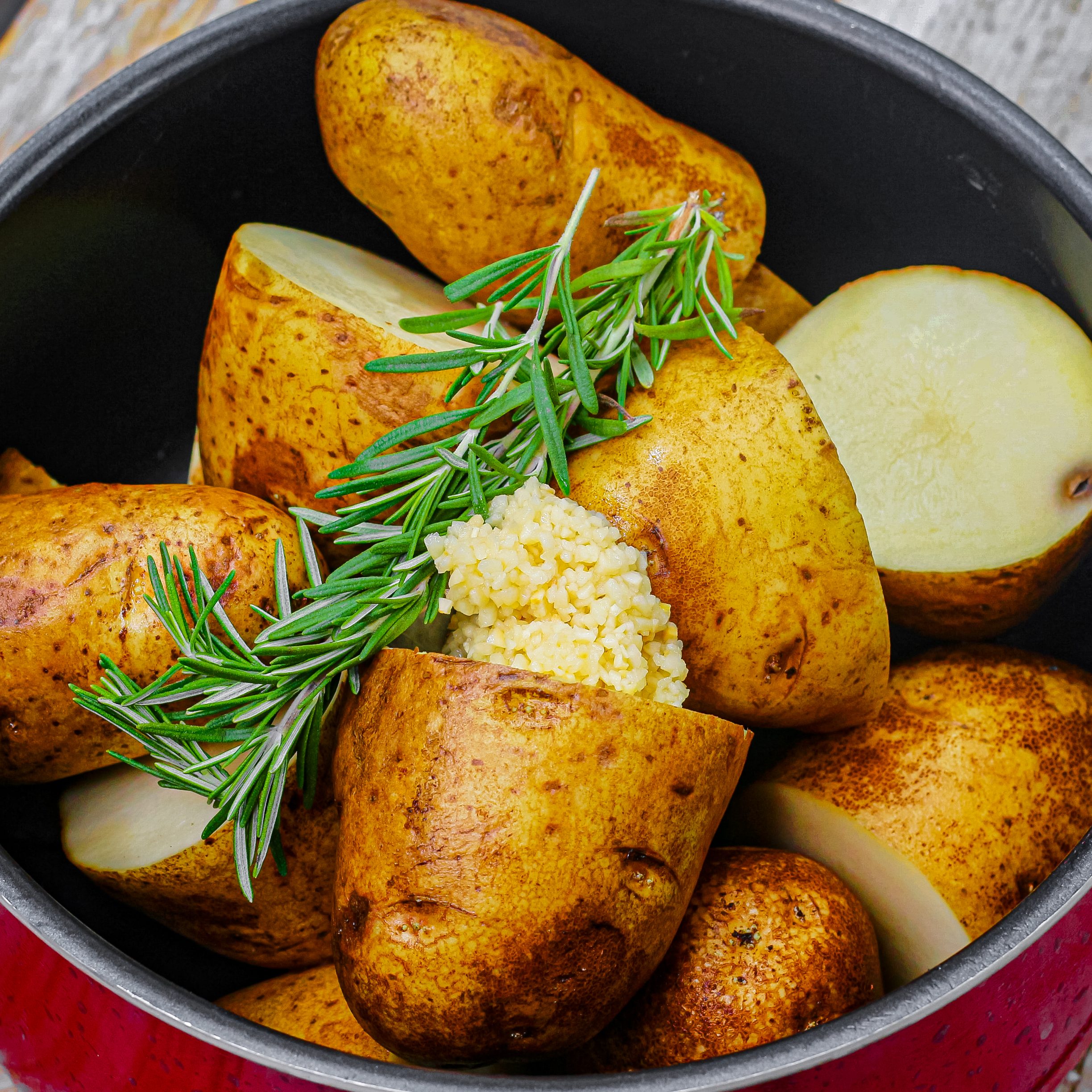 In a large stockpot add your potatoes, and enough water to submerge the potatoes.