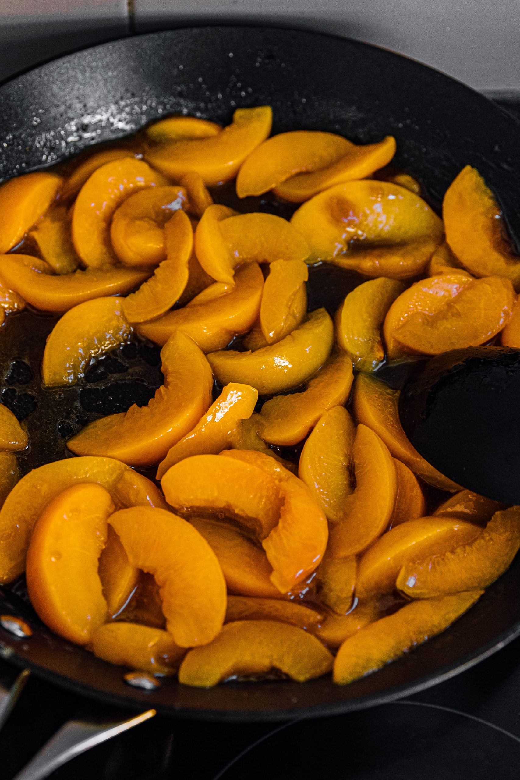 Add peaches to the pan and gently stir for 4 minutes,