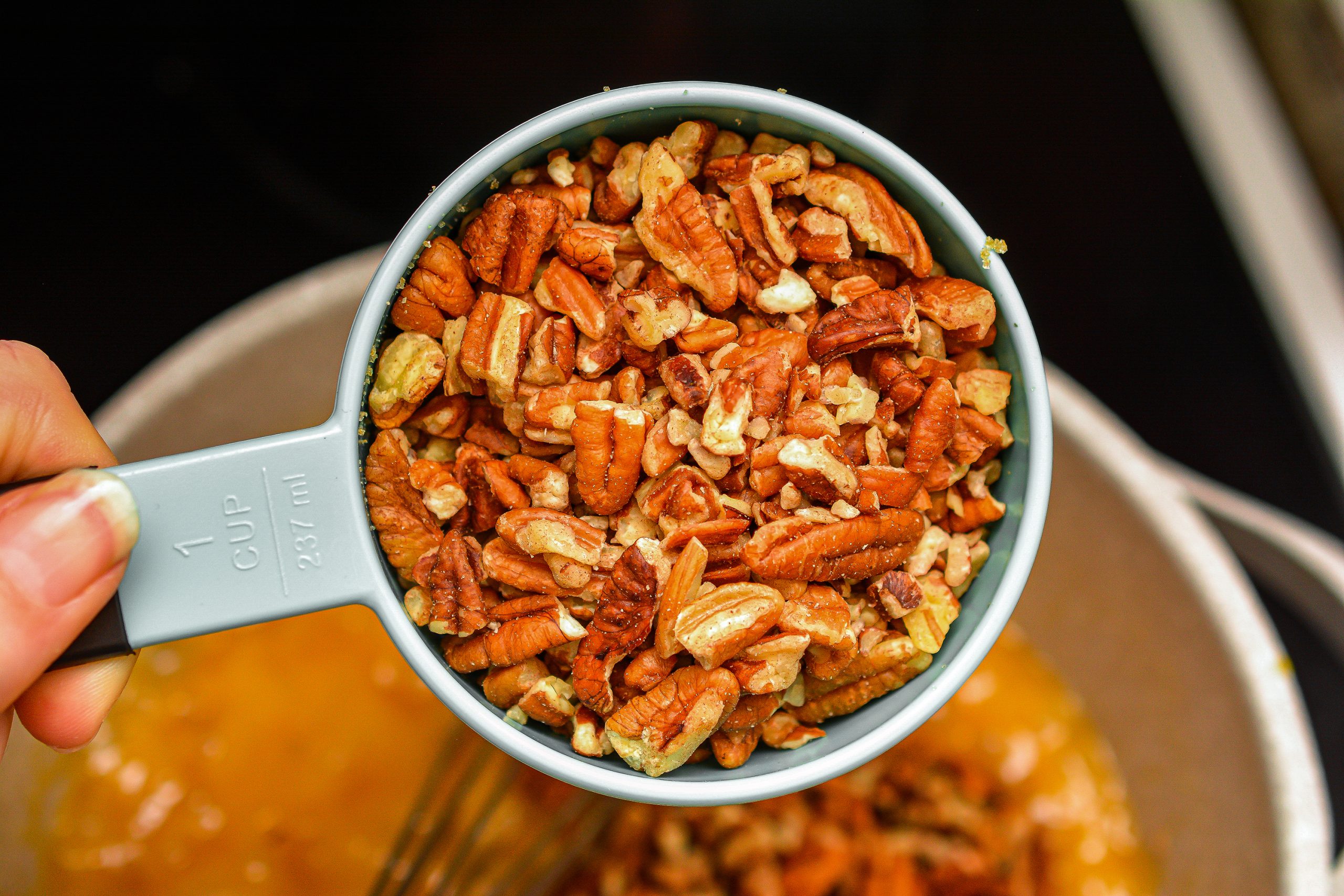 Remove the mixture from the heat and stir in the pecans.