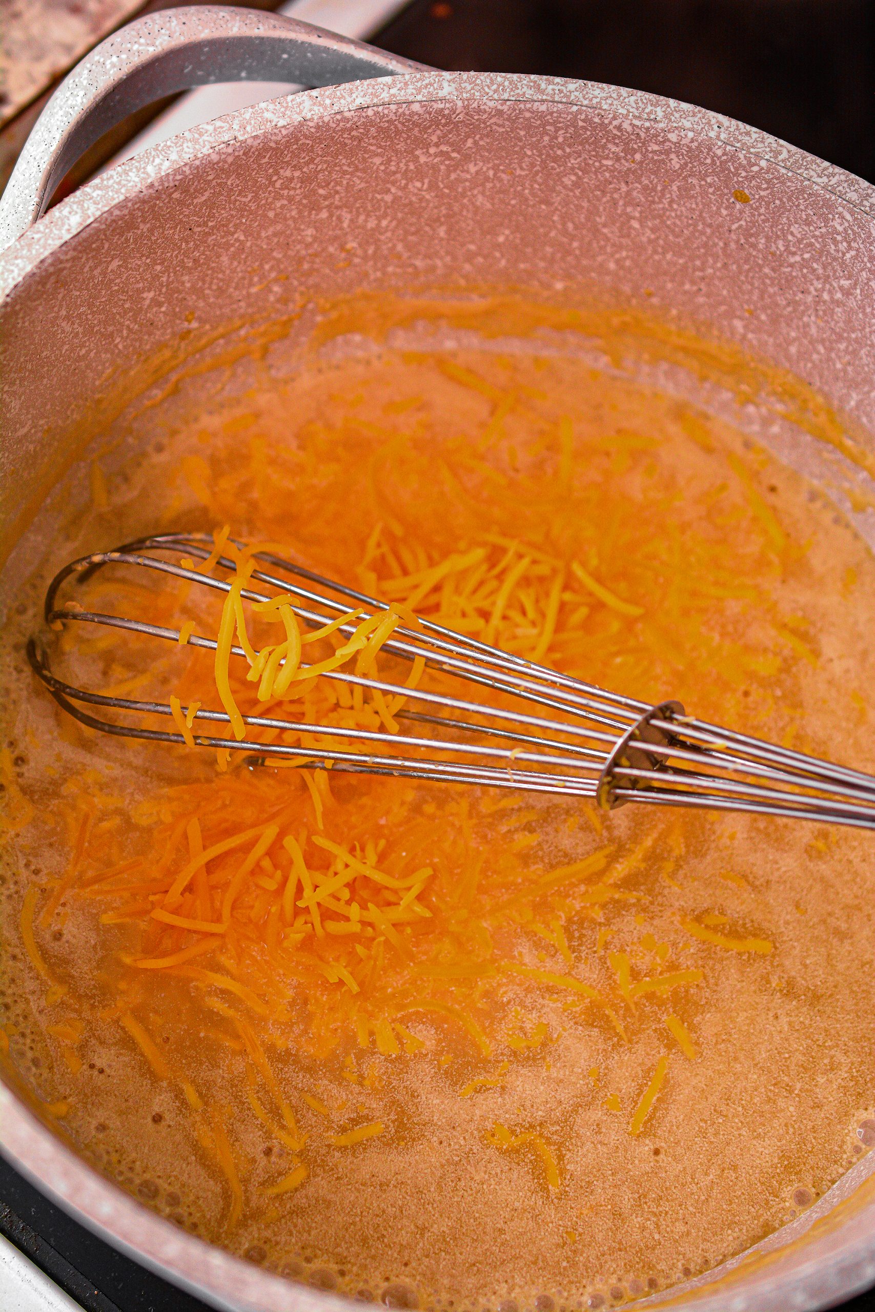 Stir the remaining cheese into the sauce.