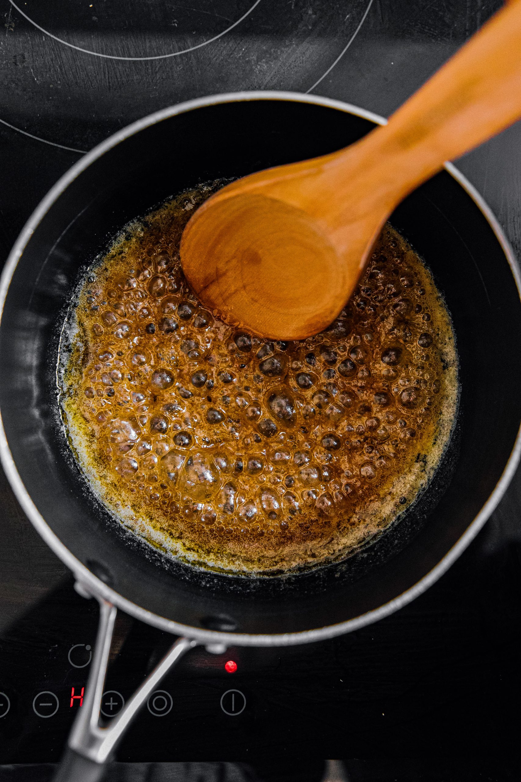In a large saucepan over medium-high heat, combine brown sugar, light corn syrup, and butter.