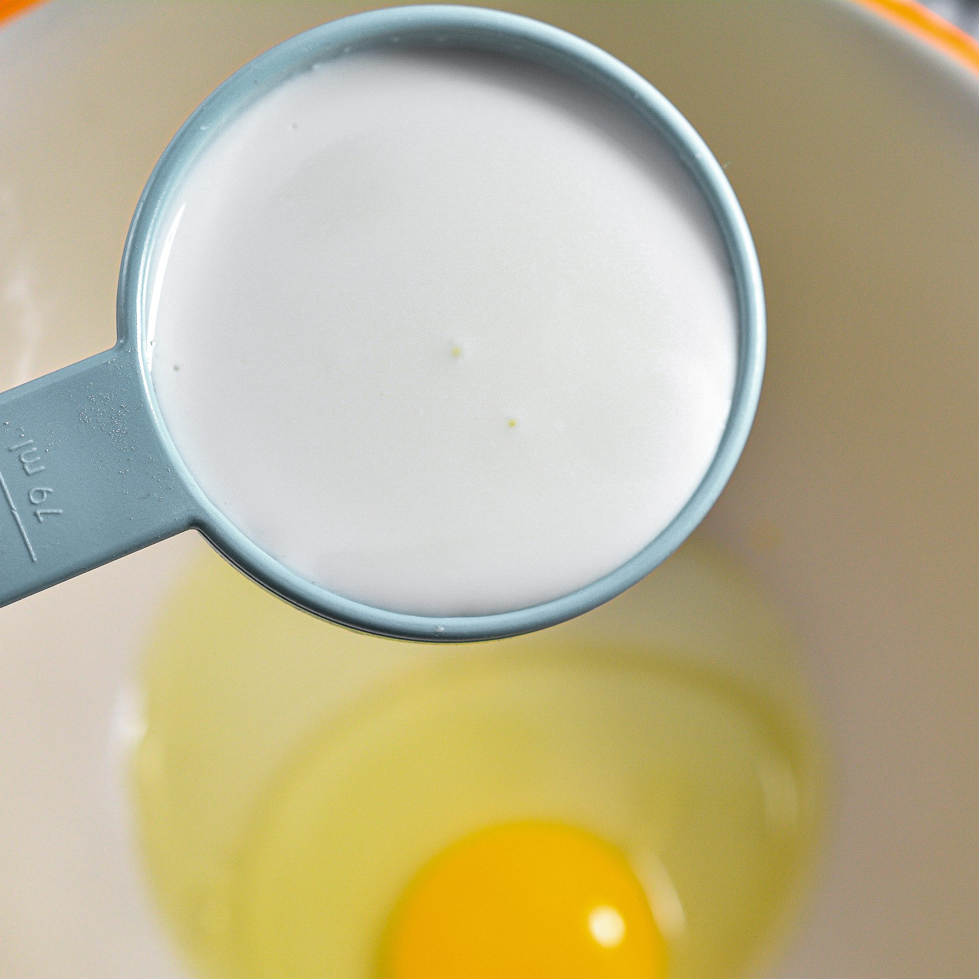 Adding eggs and buttermilk