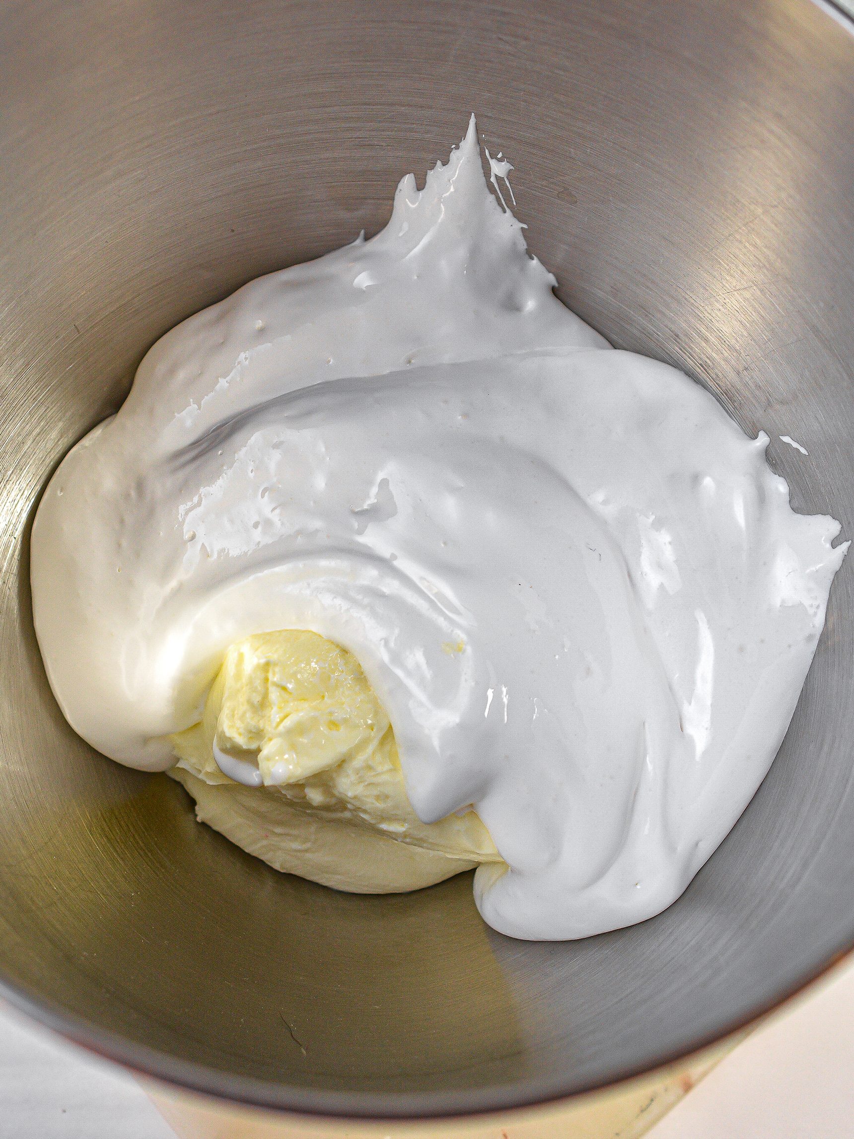 Combine the cream cheese and marshmallow creme in a mixing bowl, beating on high until creamy and well incorporated.