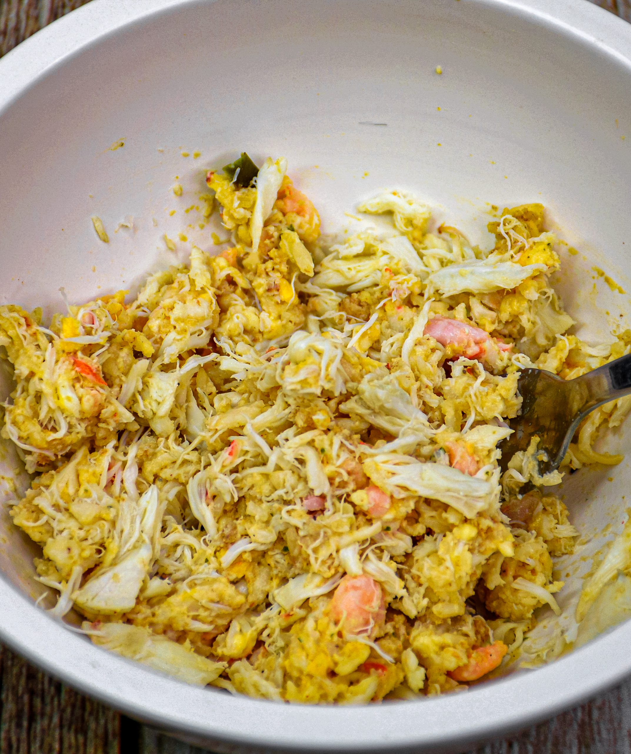 In a large bowl, mix the crab meat, shrimp, mayo, parmesan cheese, lemon juice, green onions and ¼ C bread crumbs until combined