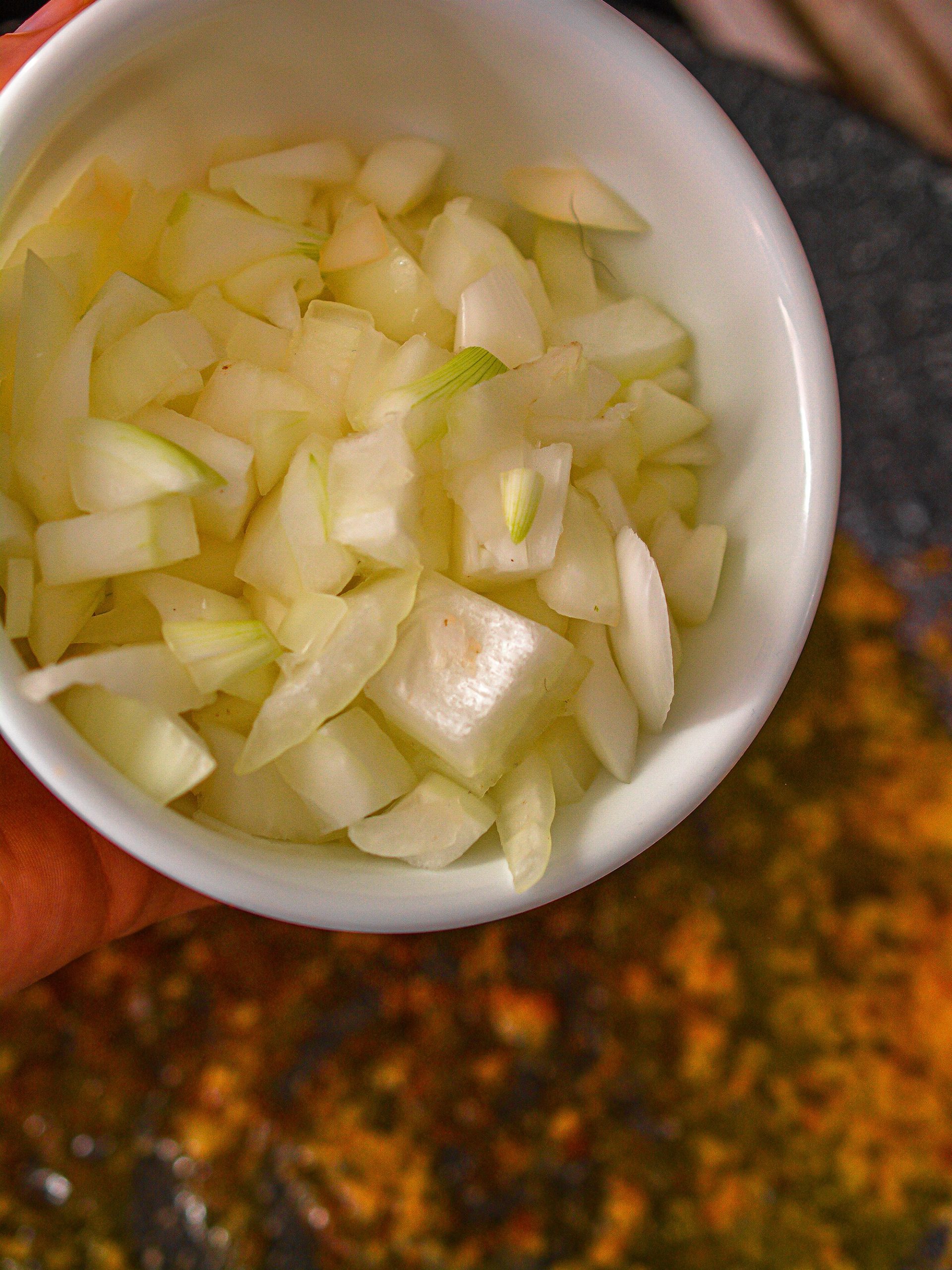 Mix the onions into the skillet, and saute until becoming tender.