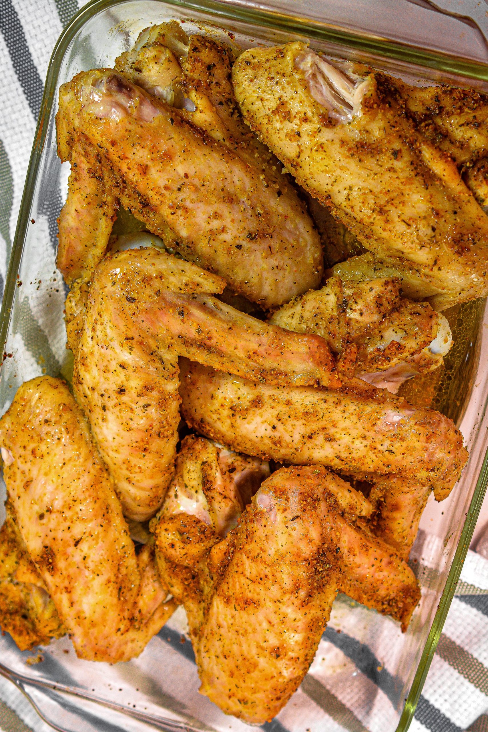 Bake for 30 minutes. Remove the foil, and bake for an additional 30 minutes, or until the wings reach an internal temperature of 165.