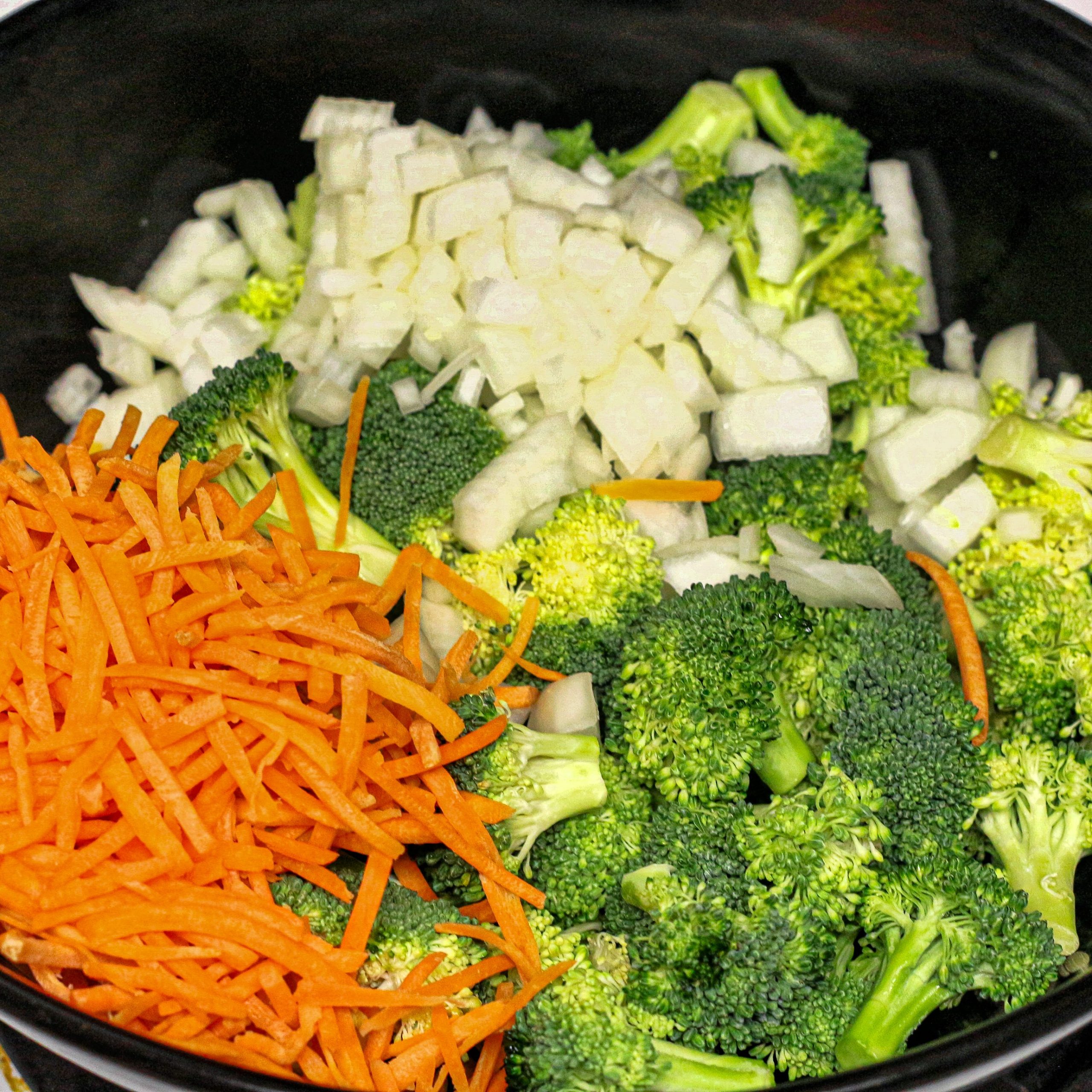 Stir-fry broccoli, carrots, and onion in the remaining oil. Add the beef and sauce.