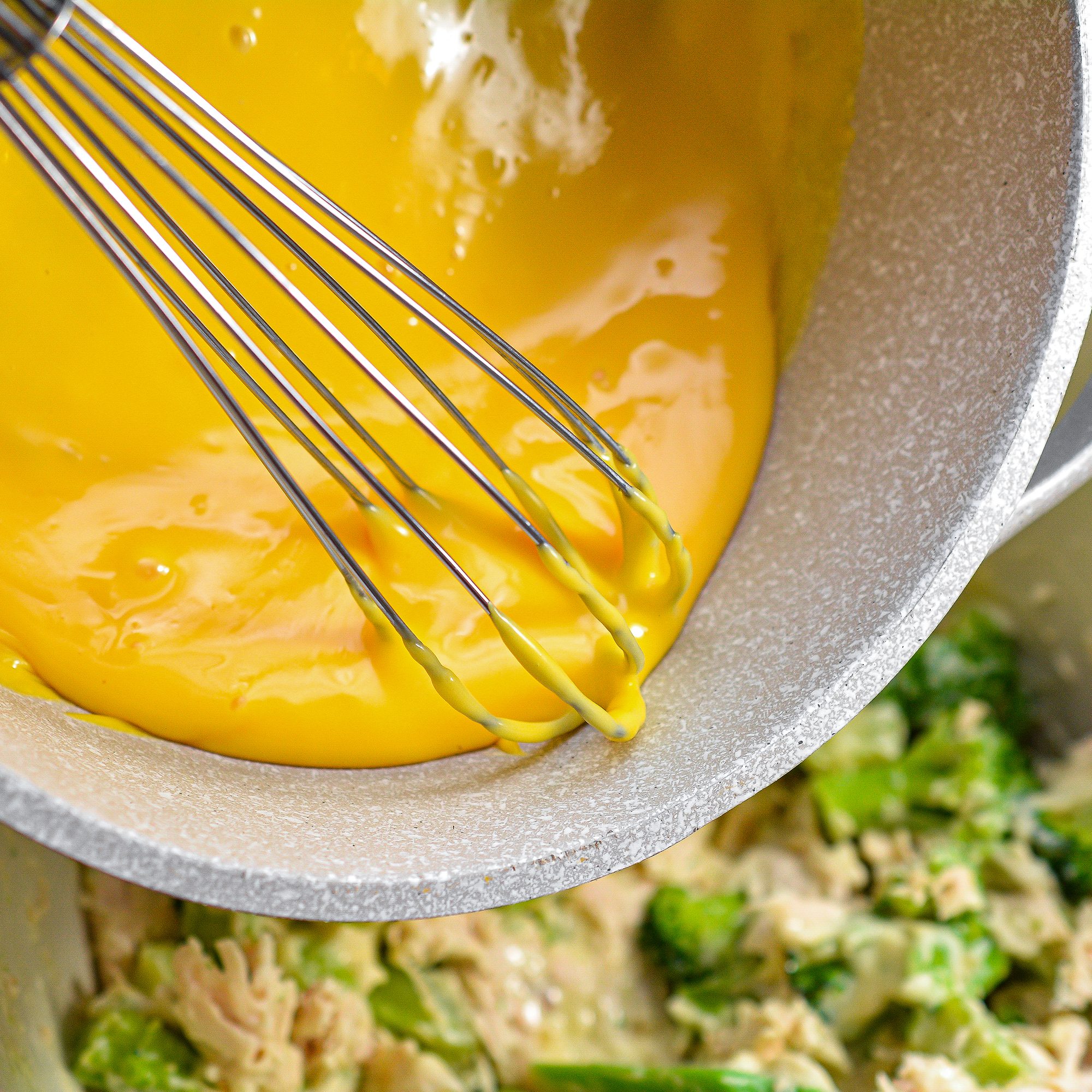 Pour the soup over the chicken and broccoli, and stir to combine.