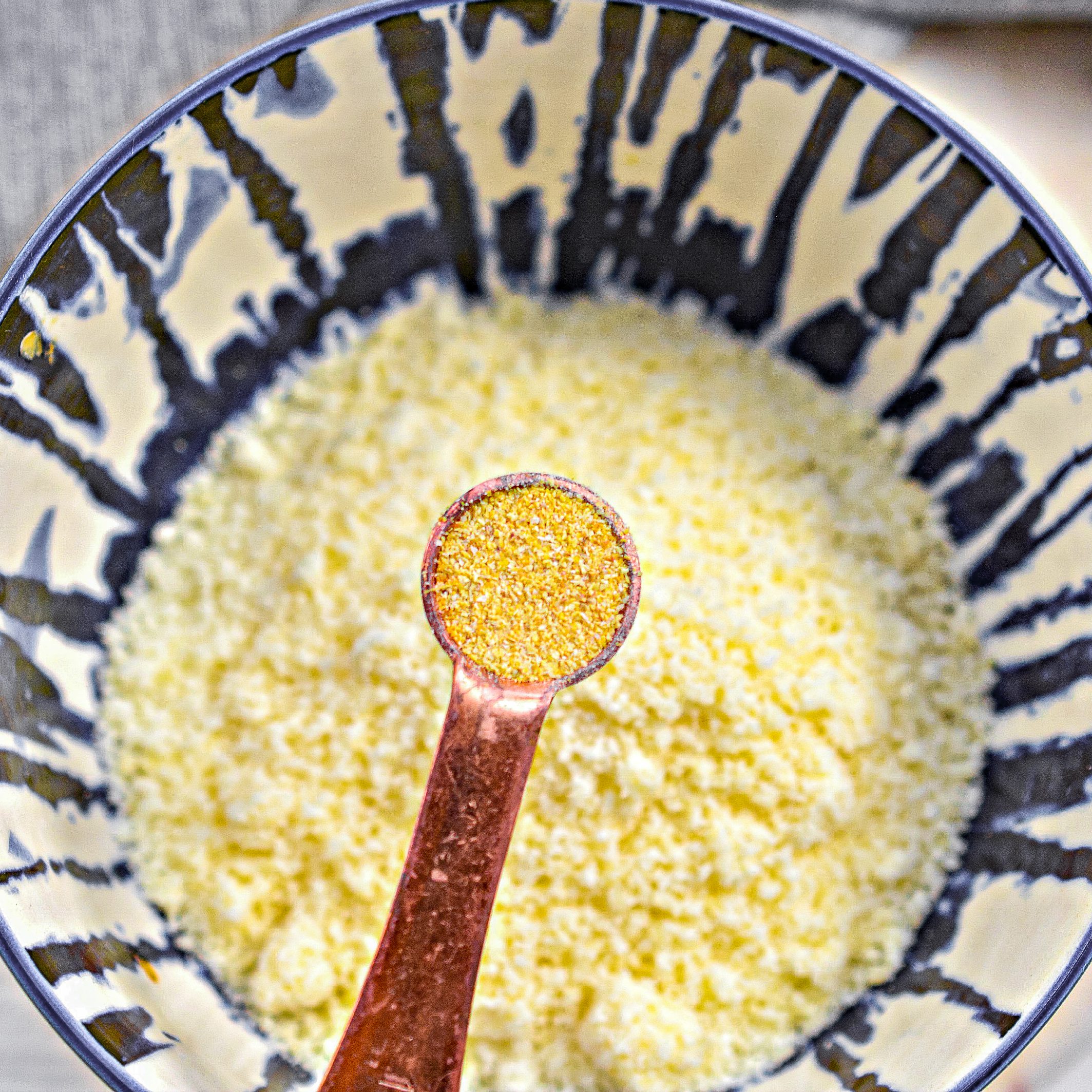 Mix together the butter, panko crumbs, Parmesan cheese, garlic powder, and chopped parsley in a bowl until well combined.
