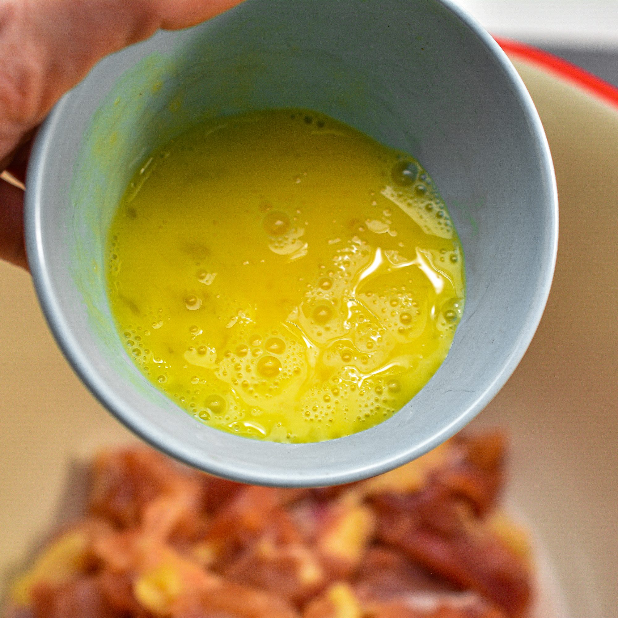 Add the chicken, egg, white pepper, and 1 tsp sugar to a mixing bowl, and toss to combine.