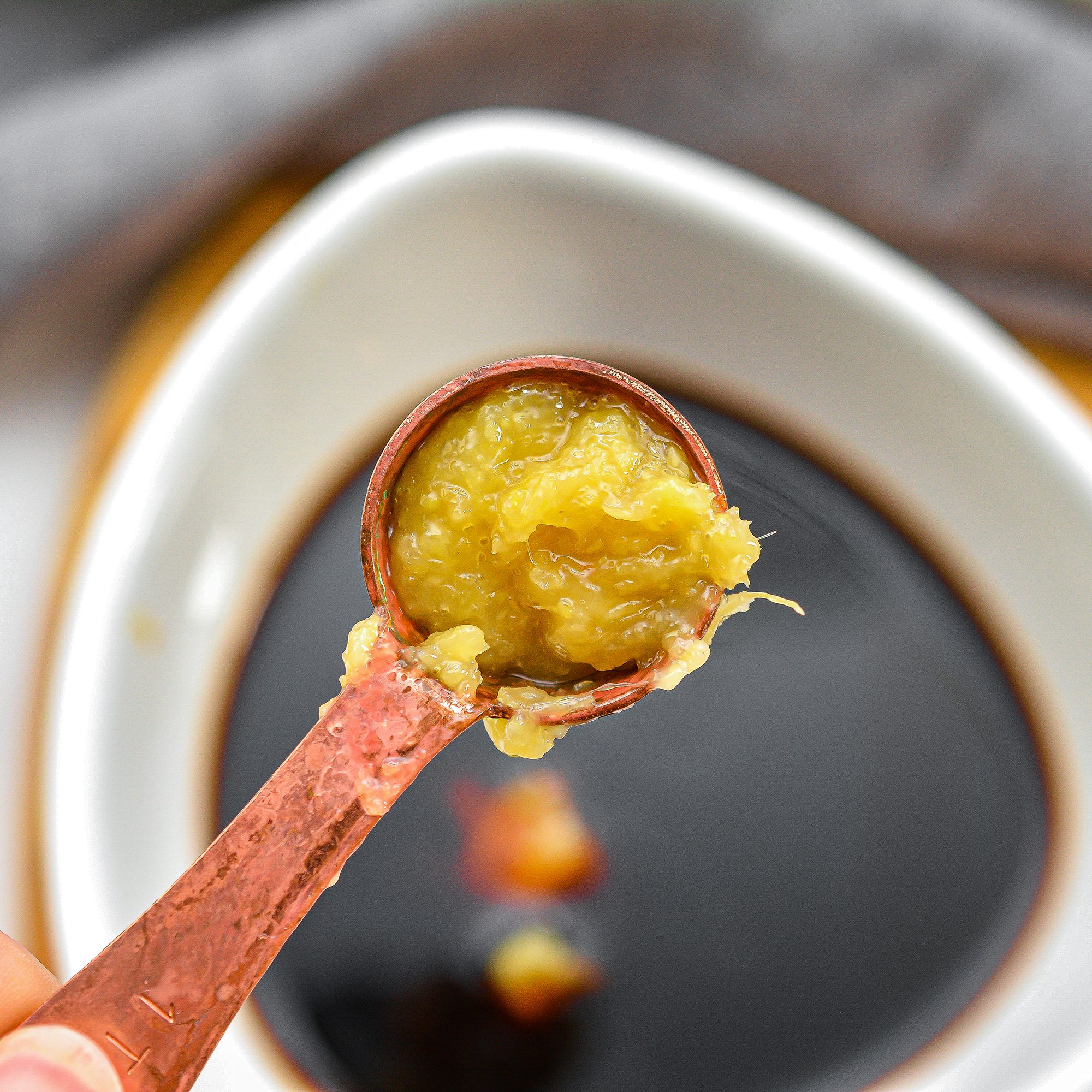 In a bowl, combine the soy sauce, chicken broth, ½ cup sugar, ginger paste, and rice wine vinegar.