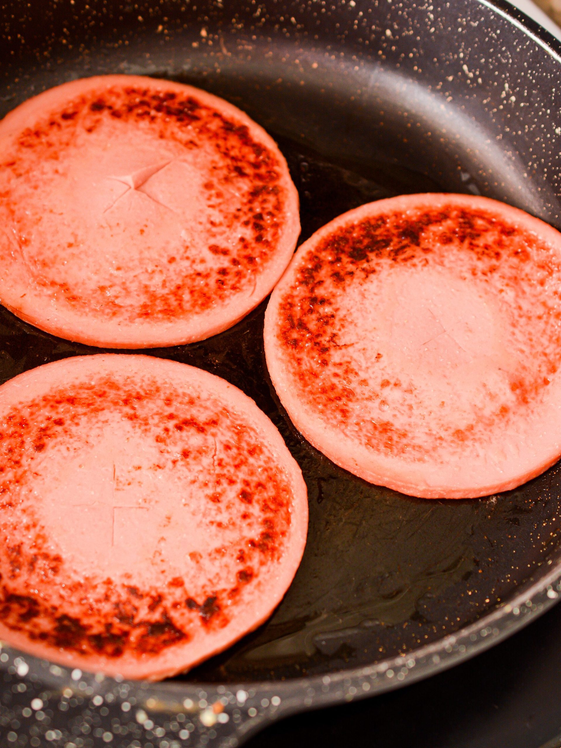 Heat a skillet over medium-high heat on the stove and spray well with cooking spray.
