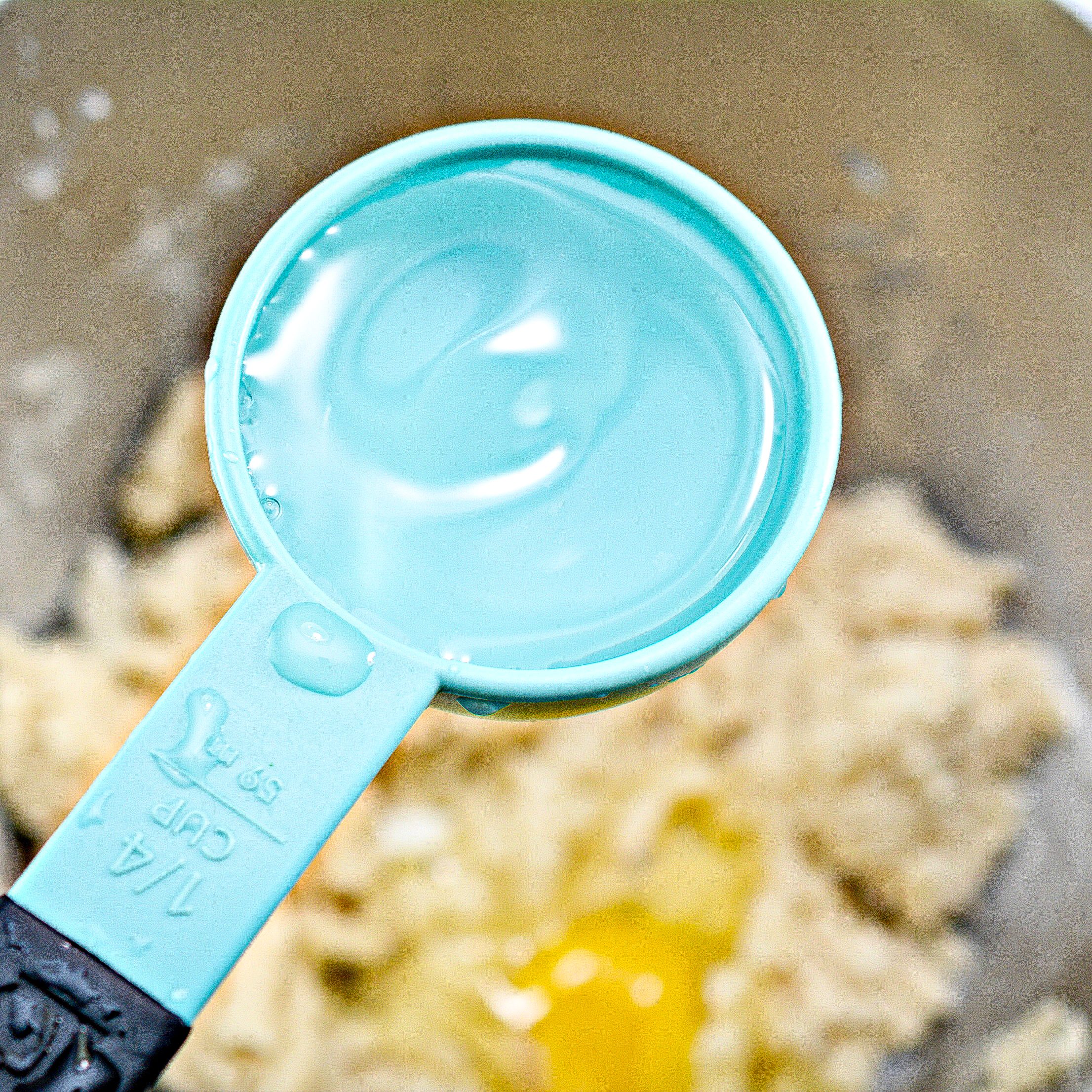 Add the water and egg to the mixing bowl and beat on high until well combined.