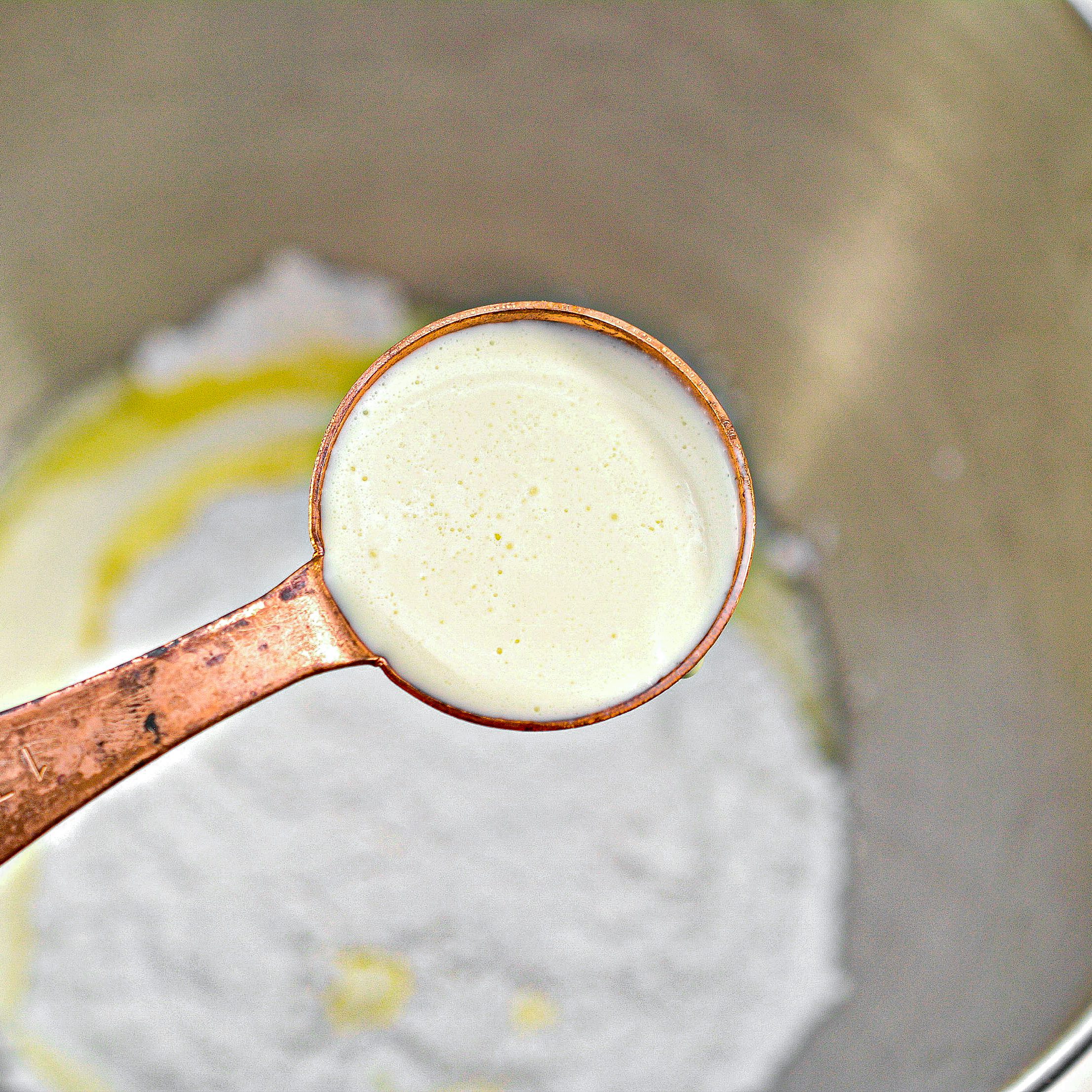 In a mixing bowl, combine the ingredients for the glaze until smooth and creamy.