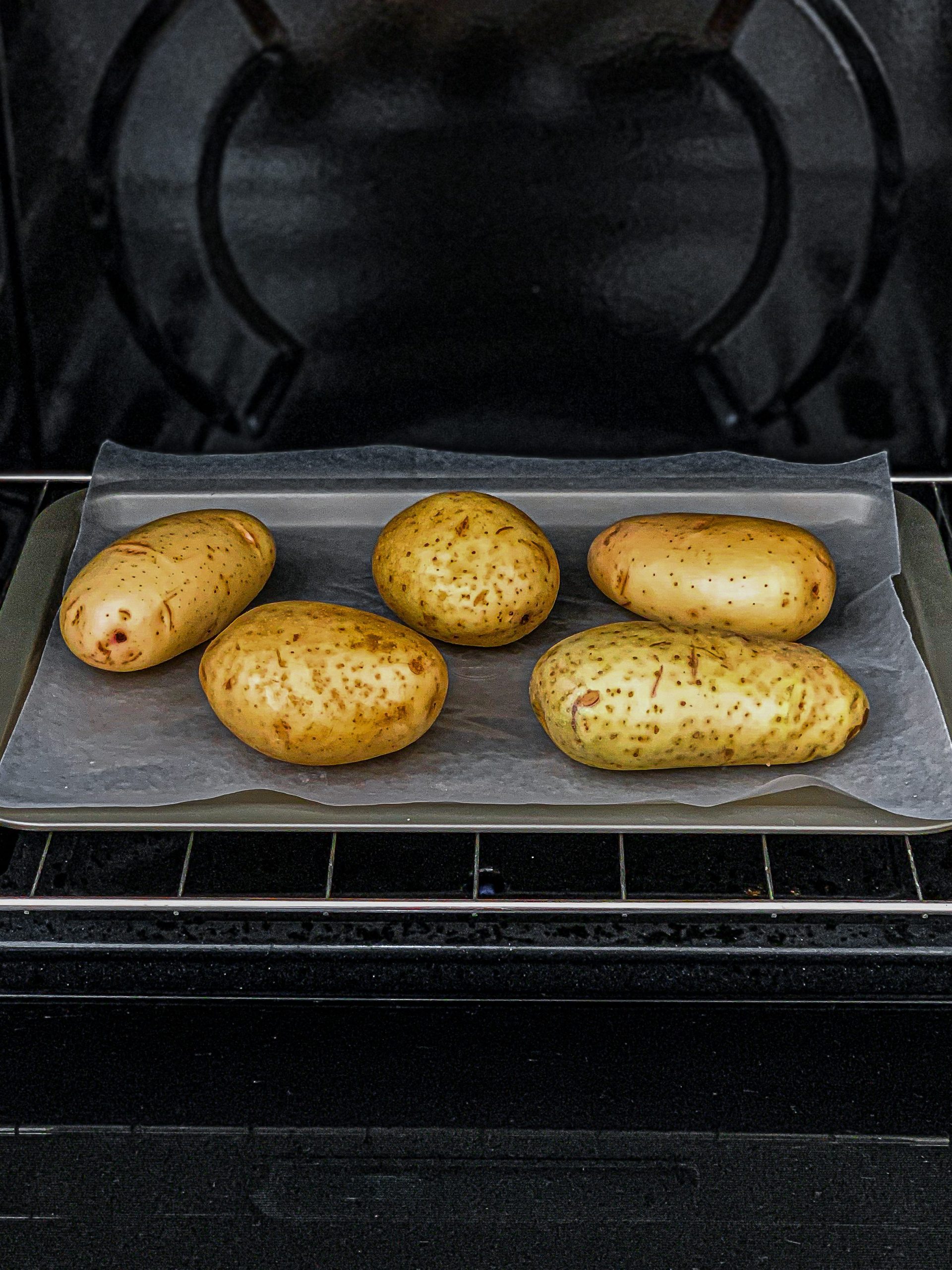 Bake 1 hour and let potatoes cool.